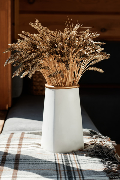 Bouquet of Wheat in White Vase